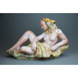 A mid 20th Century Czechoslovakian Goldscheider type glazed pottery figure of a female nude, L.
