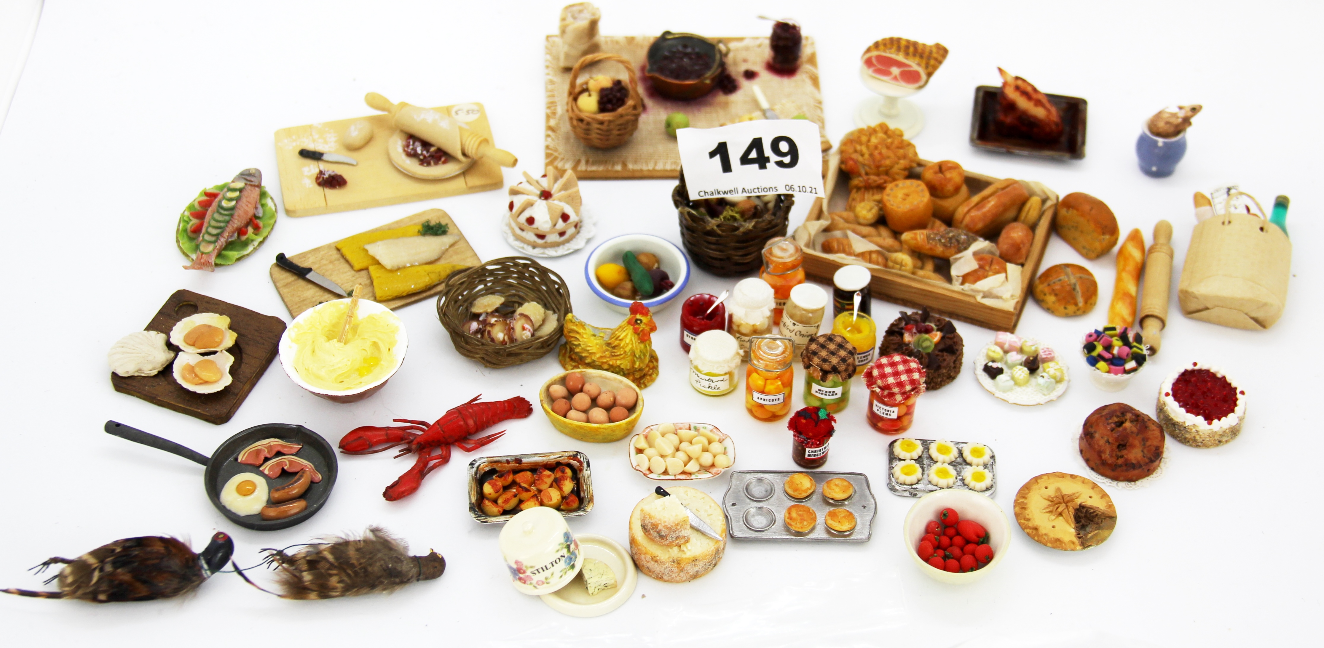 A quantity of dolls house food items.