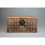 A Chinese carved hardwood chest, H. 21cm, W. 23cm, L. 39cm. (A/F)