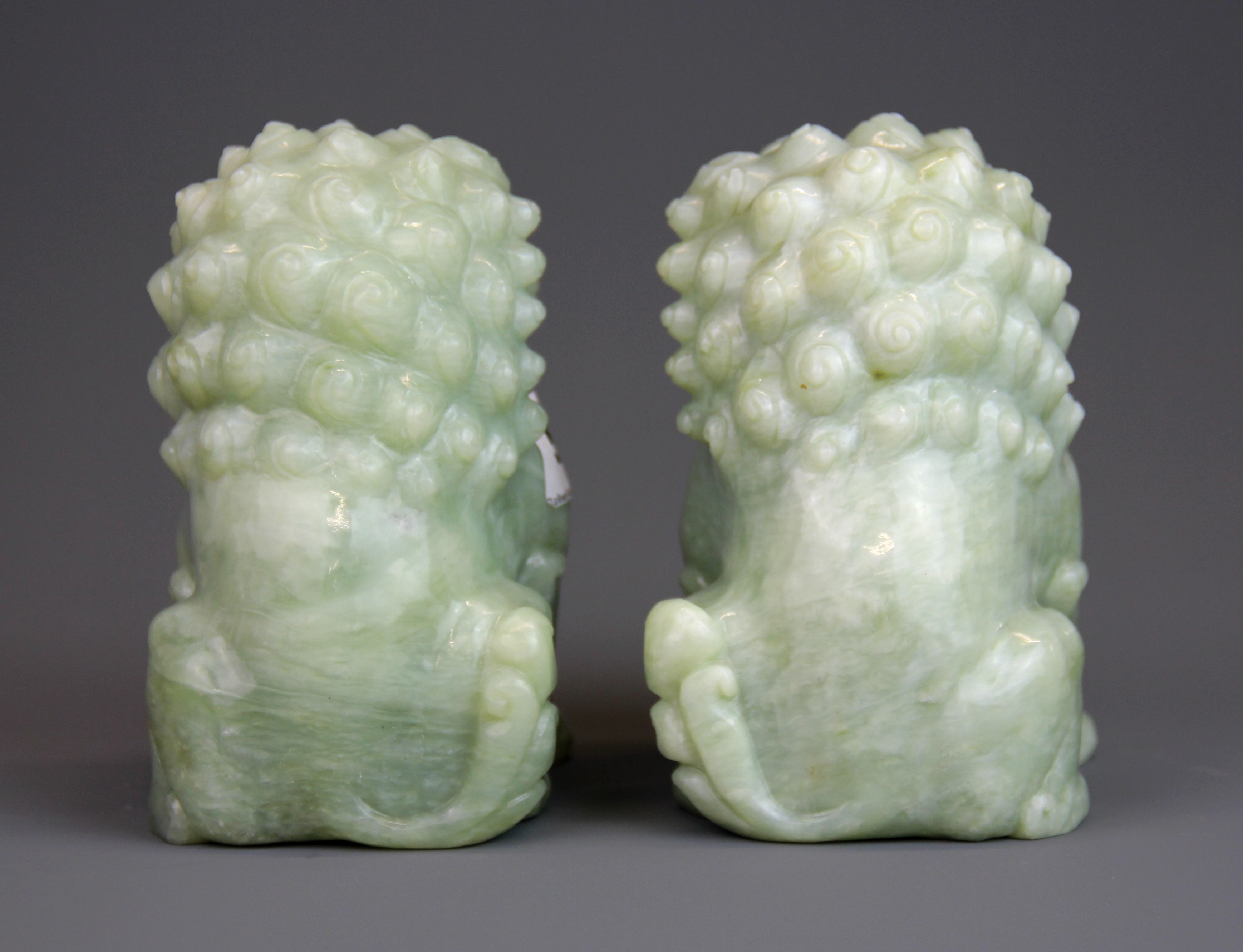 A pair of Chinese carved jade / hardstone figures of lions, H. 13. - Image 2 of 4