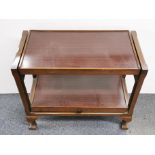 A 1960's mahogany metamorphic servery/tea table with ball and claw feet, 78 x 38 x 70cm.