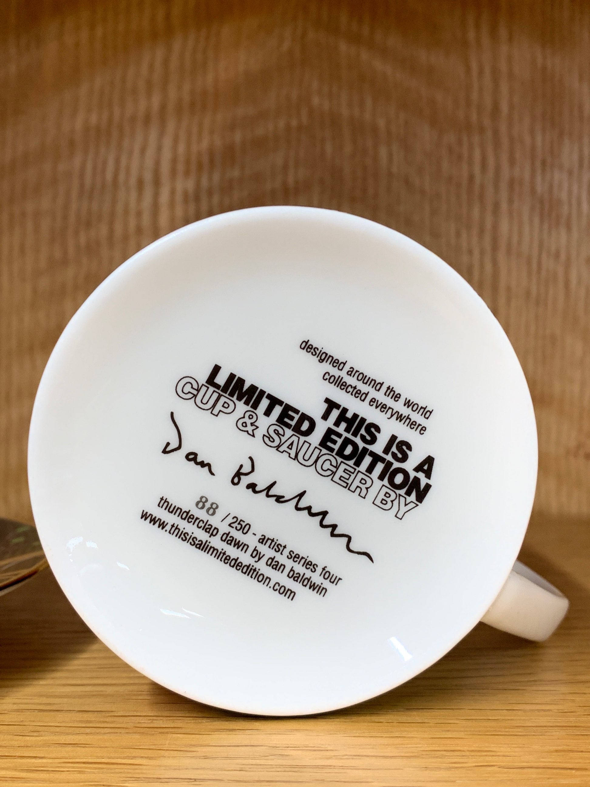 Two limited edition cups and saucers, Dan Baldwin artist series no4 88/250 and 101/250. - Image 2 of 2