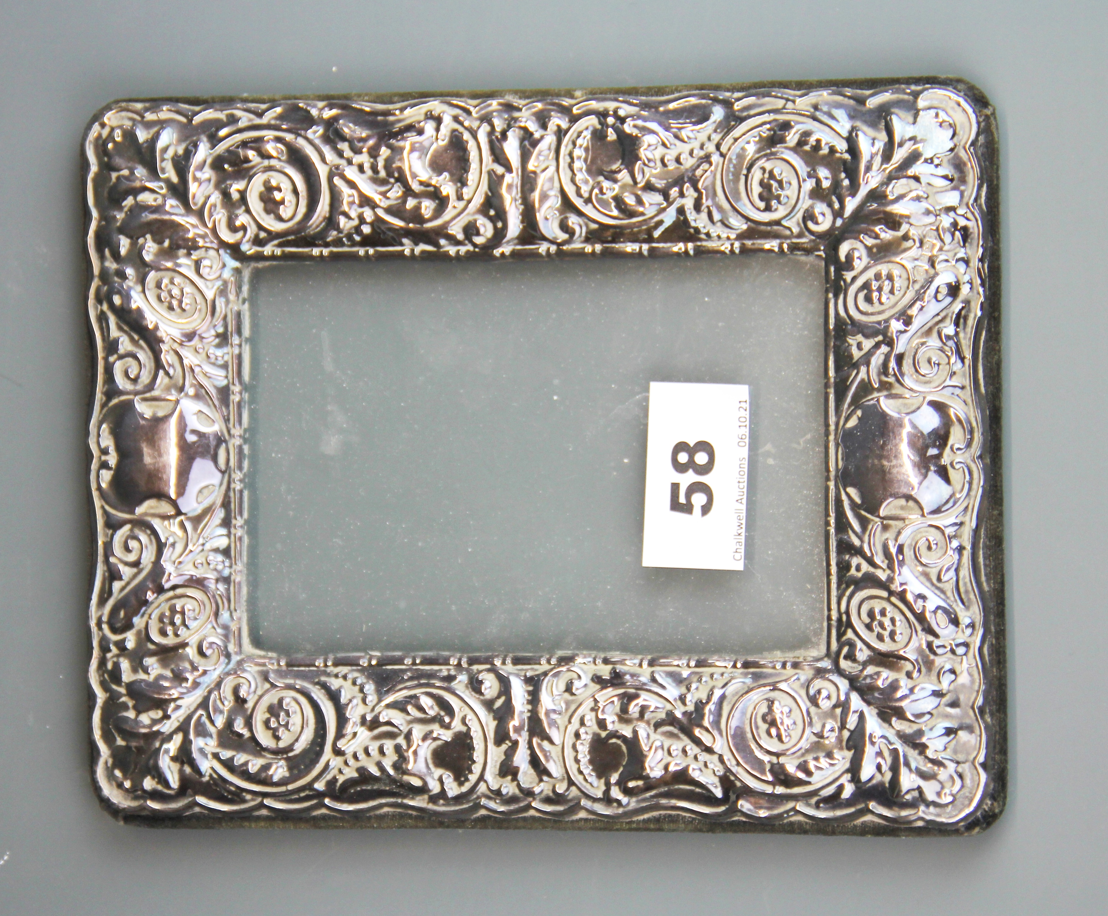 A hallmarked silver photo frame, 16 x 19cm.