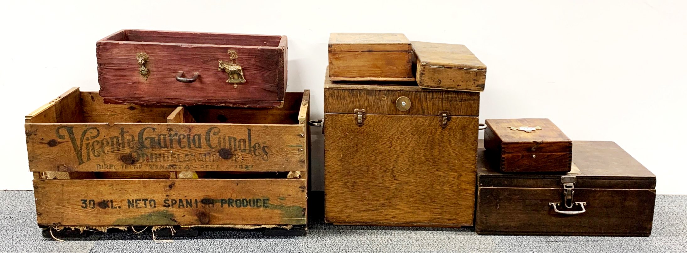 A collection of vintage wooden boxes.