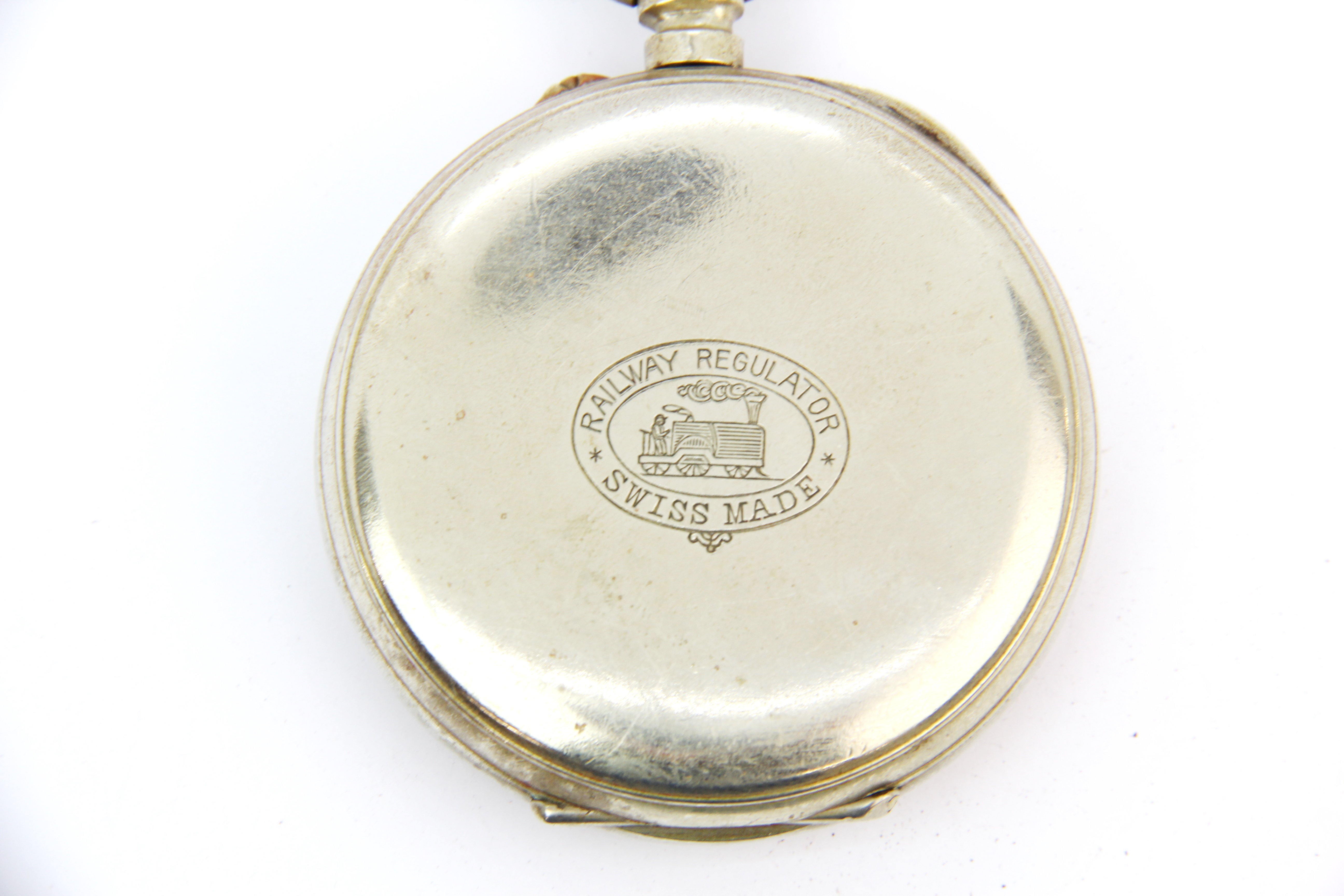 A Goliath pocket watch with a hallmarked silver chain, understood to be in working order. - Image 3 of 3