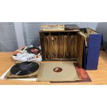 An early 20th Century oak record case and contents, together with a group of LP's and singles.