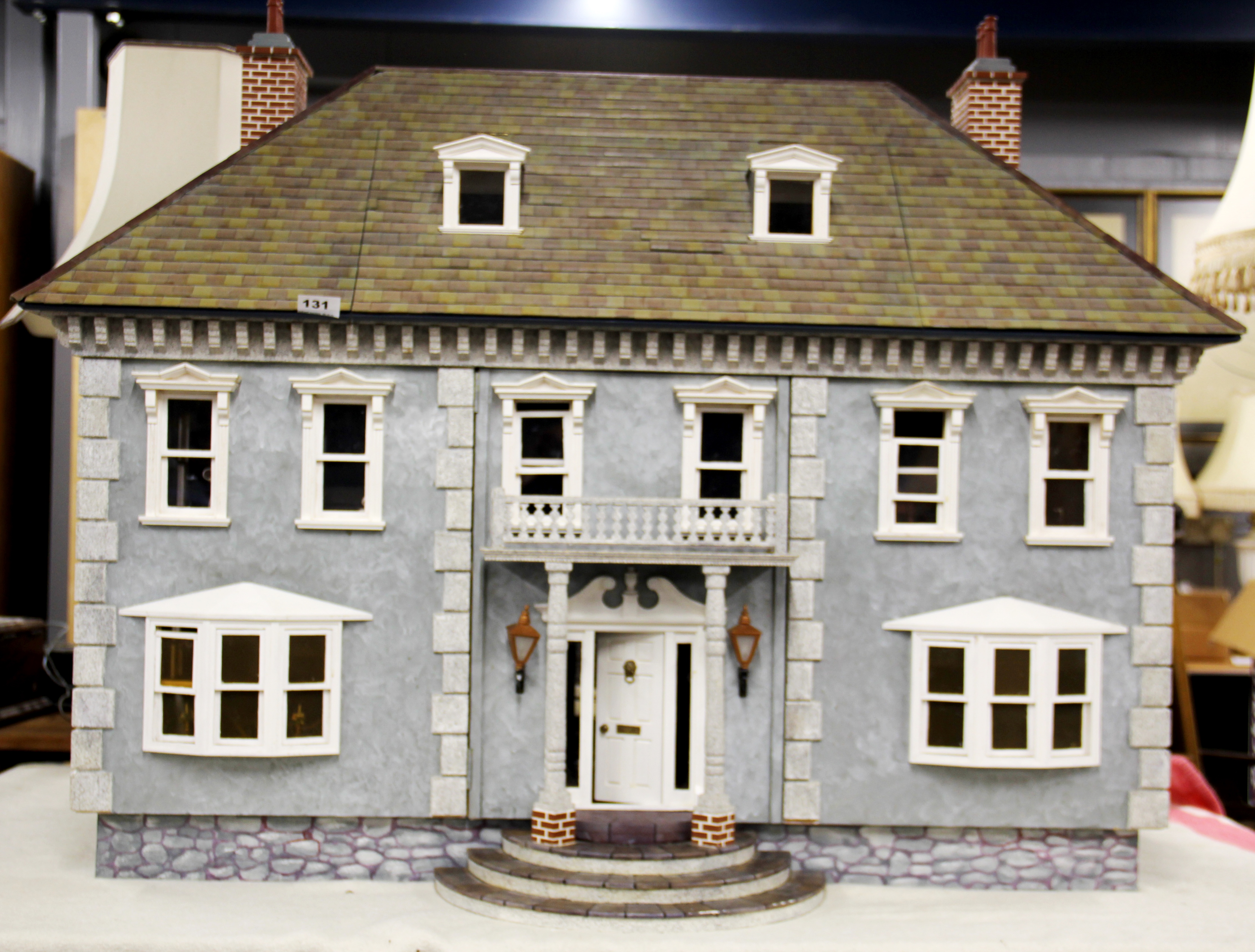 A high quality dolls house with interchangeable entrance and contents. 115 x 85 x 79cm (with large - Image 11 of 12