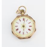 A 9ct rose gold open face ladies fob watch.