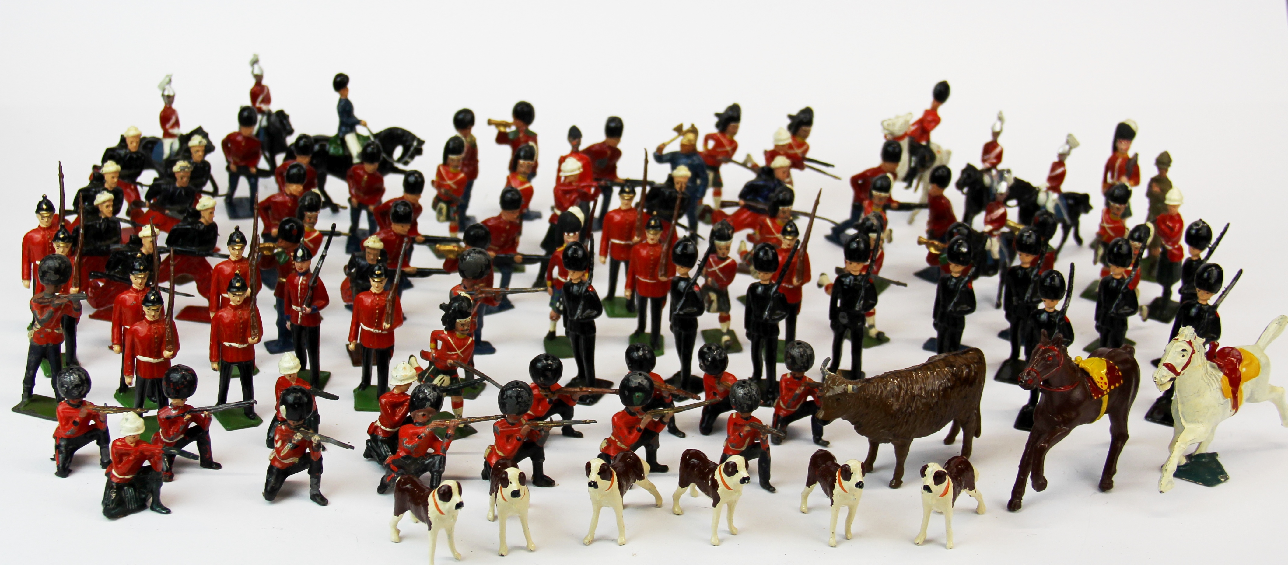 An extensive quantity antique hand painted lead soldier figures together with metal farm animal