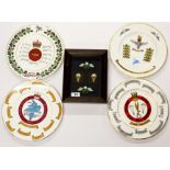 Four wall plates of the Paratroop Regiment and four framed Paratroop regiment patches.
