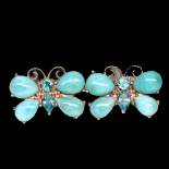 A pair of 925 silver rose gold gilt butterfly shaped earrings set with cabochon cut larimar and blue