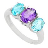 A 925 silver ring set with oval cut blue topaz and amethyst, (P.5).