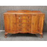 A flame mahogany veneered sideboard, H. 93cm, W. 136cm.