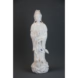 A large Chinese Blanc de Chine figure of the goddess Guanyin, H. 47cm.