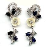 A pair of 925 silver drop earrings set with carved mother of pearl, sapphires and white stones, L.