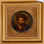A framed hand painted papier mache panel of a gentleman in a fur hat (probably Russian), frame
