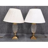 A pair of impressive cut crystal and gilt brass table lamps and shades, H. 80cm.