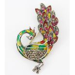 A 925 silver and enamel peacock shaped brooch set with marquise cut rubies, L. 5.8cm.