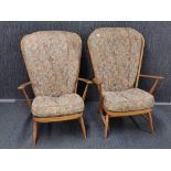 A pair of Ercol arm chairs.