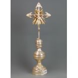 Early 20th century silvered and gilt white metal crucifix, H. 47cm.