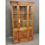 A high quality contemporary display cabinet, H. 198, W. 104cm.