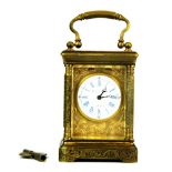 A small Elliot & Son gilt brass carriage clock, H. 12cm.