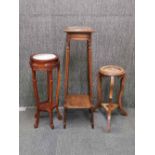 An oak an marble topped plant stand together with two further marble topped plant stand , tallest H.