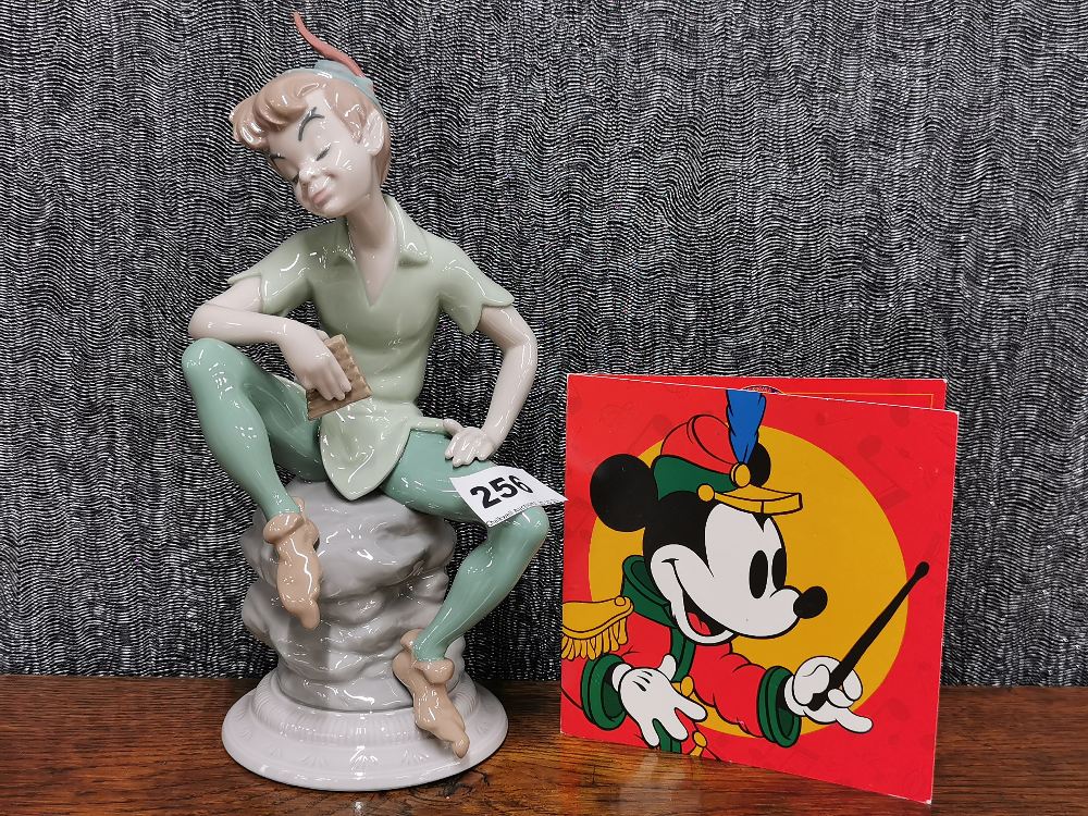 A Lladro porcelain figure of 7529 'Peter Pan', H. 26cm. With original box.