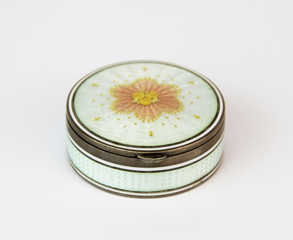 A lovely enamelled continental silver gilt box, Dia. 4.5cm.