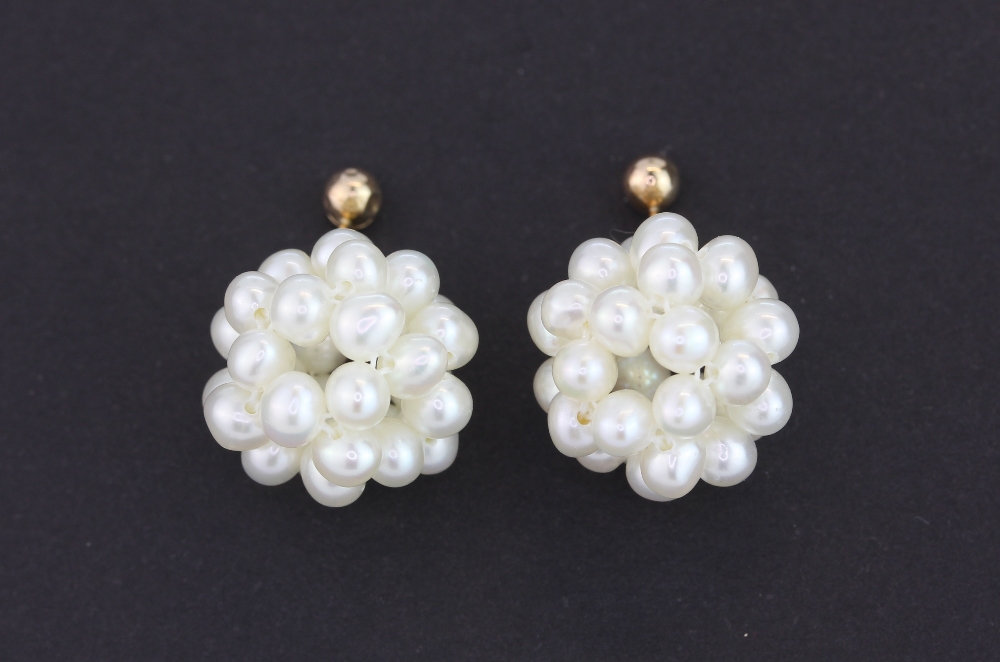 A pair of 10ct yellow gold (stamped 10k) pearl set earrings, L. 2cm.