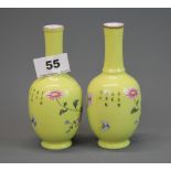 A pair of hand enamelled porcelain vases, H. 14cm.