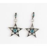 A pair of 18ct white gold star shaped drop earrings set with brilliant cut diamonds and fancy blue