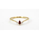 An 18ct yellow gold ring set with marquise cut rubies and diamonds, (P.5).