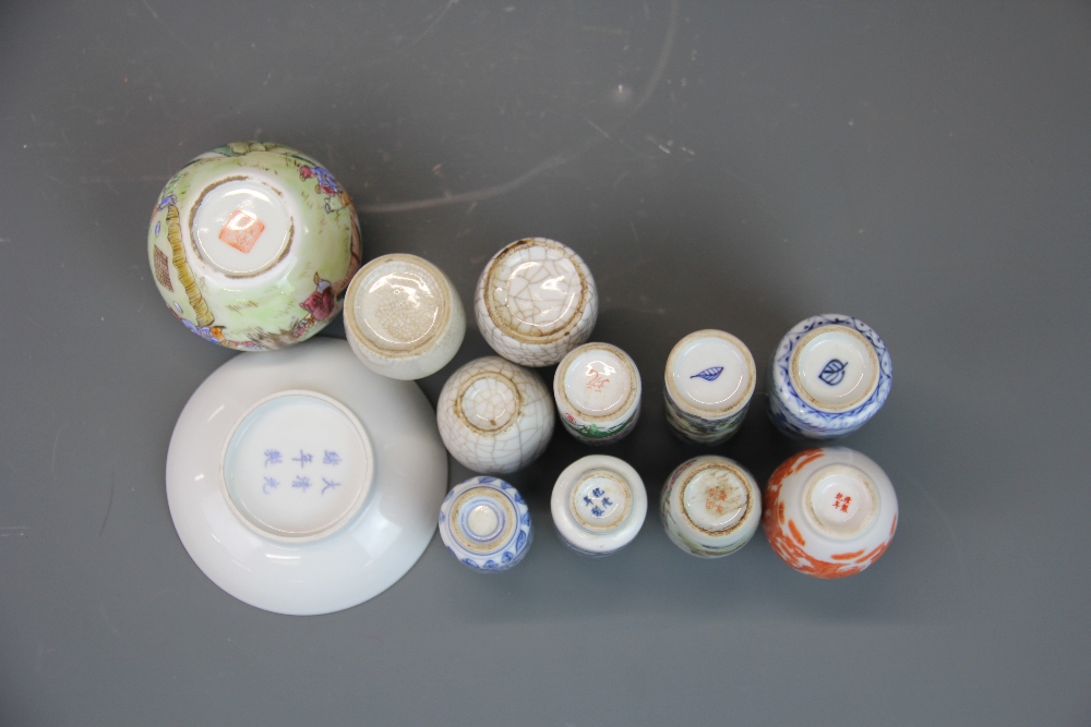 A group of Chinese porcelain snuff bottles with a brush washing bowl and dish. - Image 2 of 2