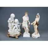 Three fine 19th century continental porcelain figurines, tallest 16cm.