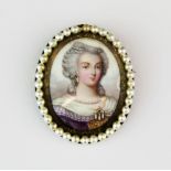 A 19th century hand painted enamelled on copper portrait miniature mounted as a brooch, L. 4.5cm.