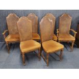 A set of six caned backed dining chairs.