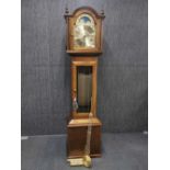 A contemporary oak Fenclocks moonphase chiming long case clock, H. 194cm. In working order