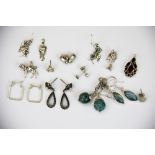 A quantity of mixed silver earrings.