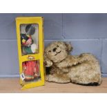 A box Pelham puppet and a 1940's plush dog tea cosy.