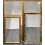 A pair of gilt framed mirrors together with two further mirrors, largest, 120 x 58cm.