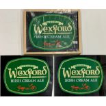 A framed and illuminated Wexford Irish cream ale advertising sign plus two unframed signs, frame