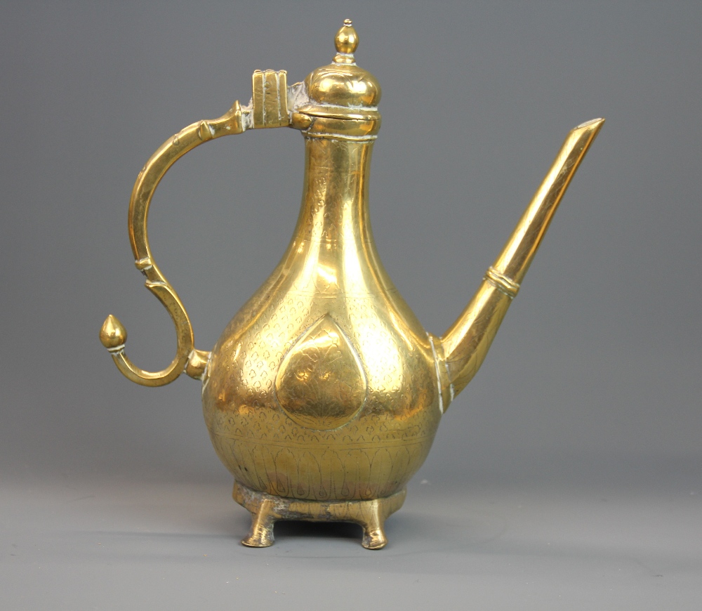 An early Indian polished bronze jug with engraved decoration, H. 30cm. - Image 2 of 2