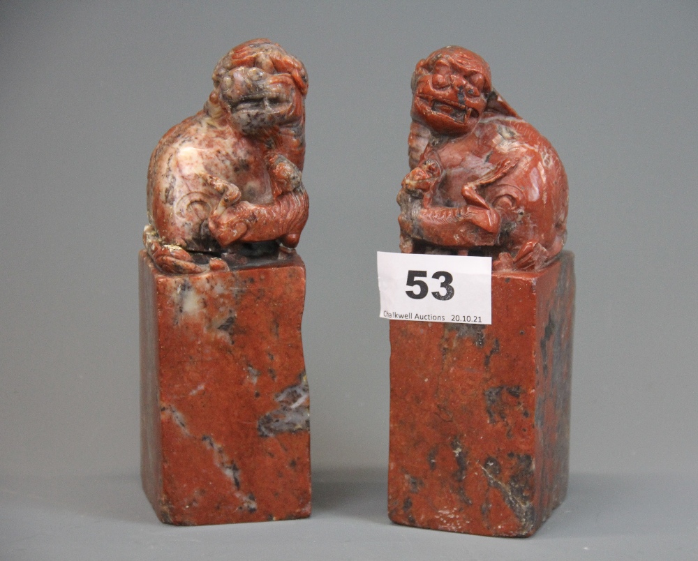 A pair of Chinese carved soapstone seals, H. 15.5cm.