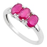 A 925 silver ring set with three oval cut rubies, (Q).
