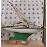 A vintage mounted model of a wooden pond yacht, L. 45cm.
