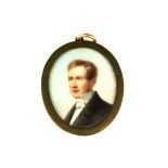 A 19th century hand painted portrait miniature of a young gentleman, L. 5cm.
