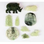 A group of Chinese carved jade and other hardstone items.
