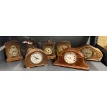 A group of seven 19th and early 20th century mantle clocks, tallest 22cm.