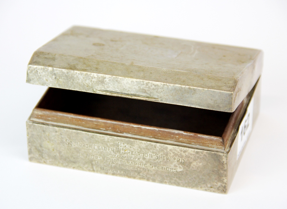 A hallmarked silver covered cigarette box, 11 x 9 x 4cm.